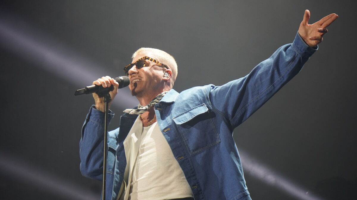 US-Rapper Macklemore während seines Auftritts auf dem Deichbrand-Festival – sein politisches Statement sorgte für Diskussionen. Foto: Brettschneider