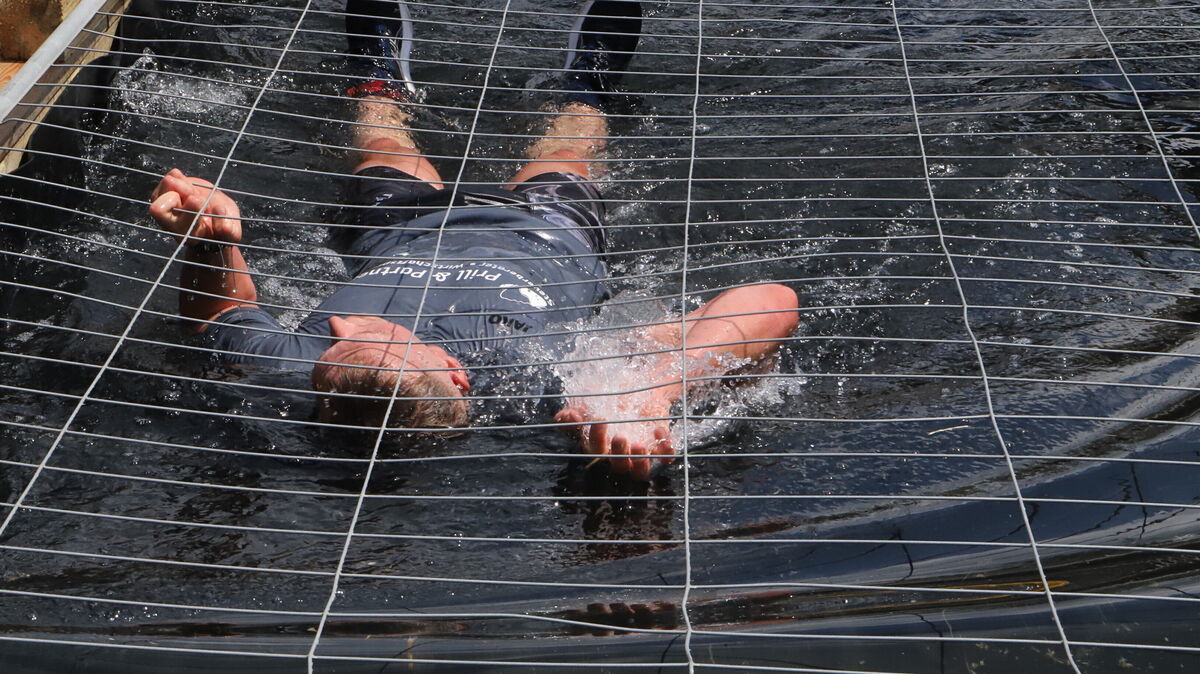 Kurz vor dem Ende des Giants Run wartete das neue Hindernis "Neptuns Fence" auf die Athleten. Überhaupt kamen die Hindernisse trotz der Strapazen bei den Aktiven gut an. Foto: Witthohn